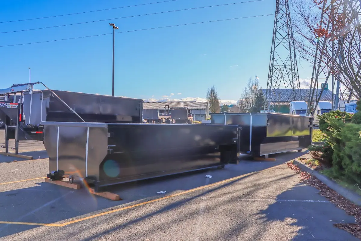 Roll-off dumpster ready for waste disposal at job site for 2 Yard Dumpster Rental in Cloquet